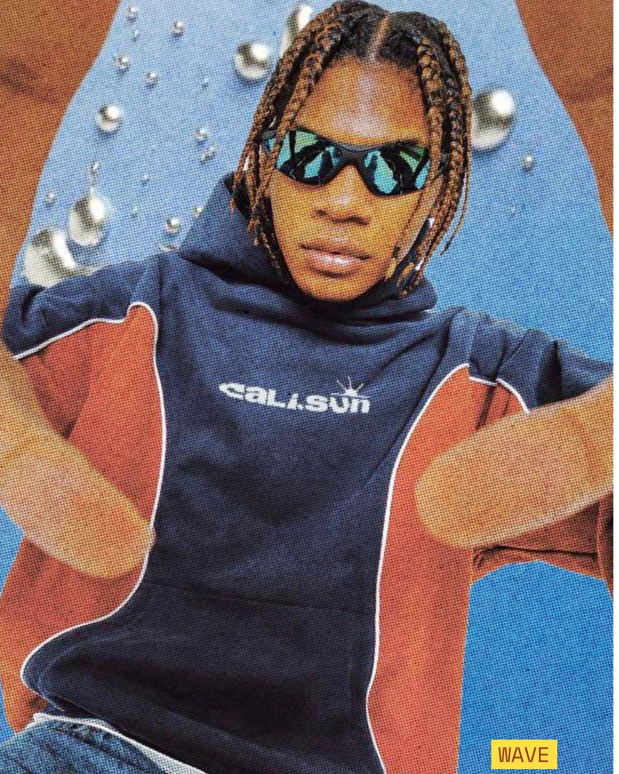 Person wearing Cali Sun streetwear and sunglasses in a blue surreal collage