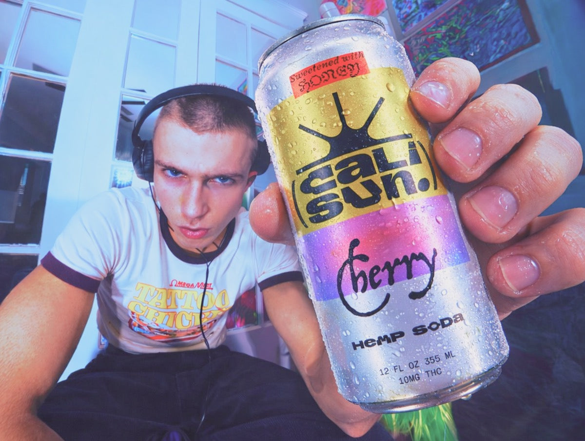 Cali Sun Cherry future soda in a blue-lit social setting